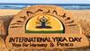 Sudarshan Patnaik creates sand art at Puri beach on International Yoga Day