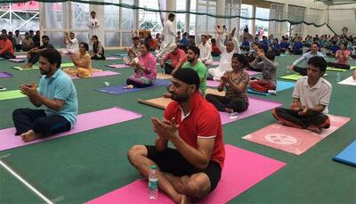 In Pics: BCCI president Anurag Thakur, Harbhajan Singh participate in Yoga Day
