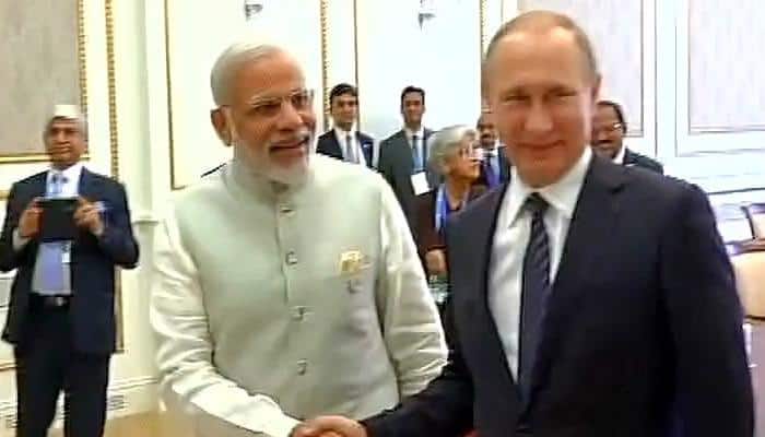 Modi, Putin vow to take forward India-Russia ties