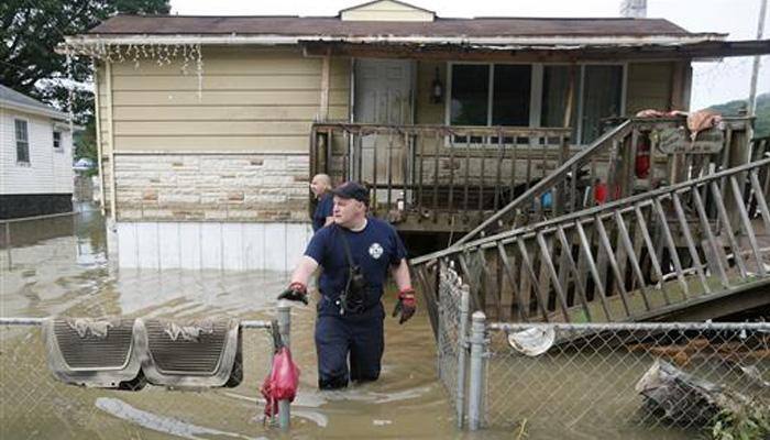 US floods: 24 dead in West Virginia; search and rescue continues