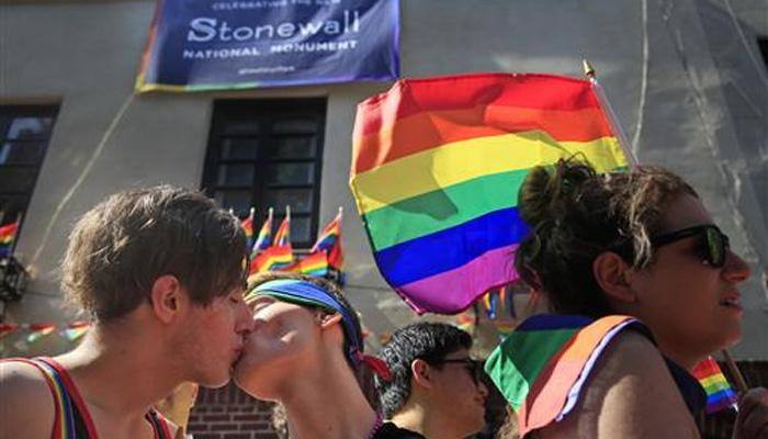 US parades celebrate Gay Pride, honor Orlando victims