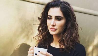 Nargis Fakhri looks smoking hot in this outfit with plunging neckline – See Pics