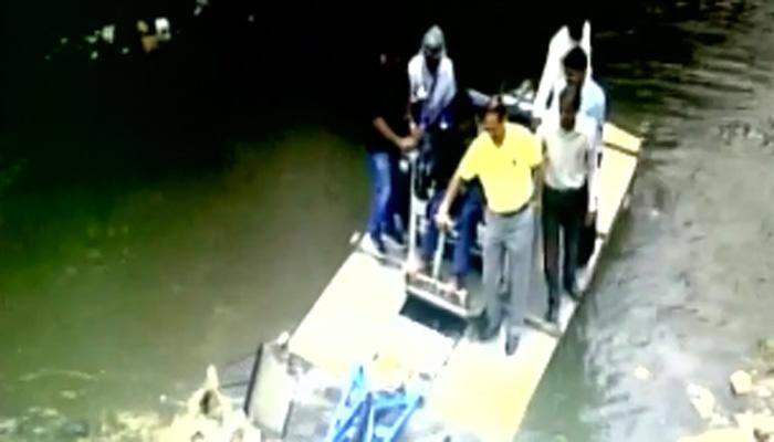 Watch: Panaji Mayor Surendra Furtado, 6 others fall in creek during a de-weeding drive