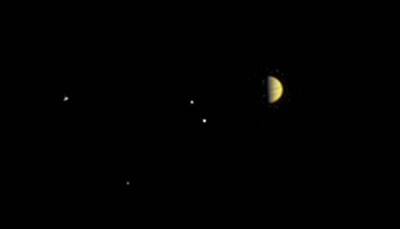 Juno on Jupiter's doorstep: Stunning view of giant planet and its largest moons (Pic inside)!