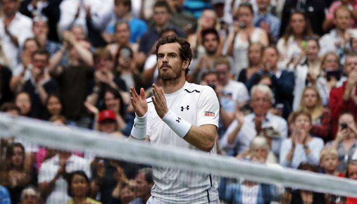 Andy Murray centre stage as wet Wimbledon plays catch-up