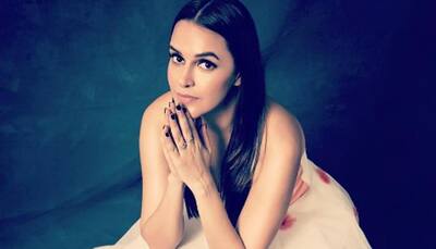 Neha Dhupia bids goodbye to summer monster with pastel frock!- See pic