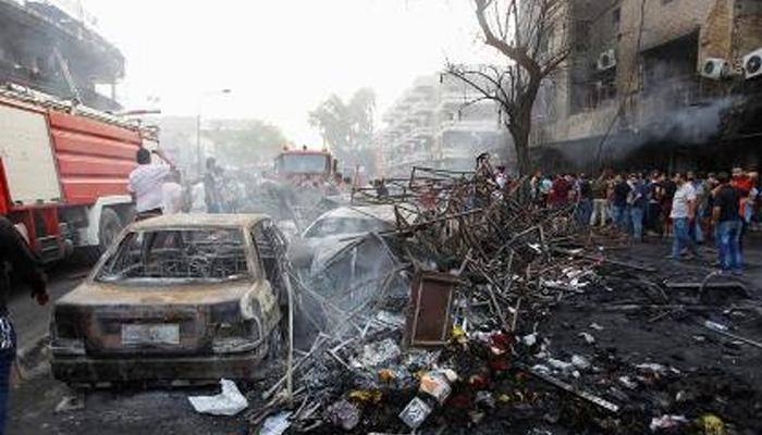 12 killed in Baghdad&#039;s car bombings; ISIS claims responsibility