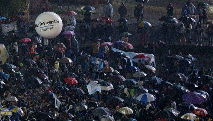 PHOTOS: Battling rain, thousands of Lionel Messi&#039;s fans take to street in Argentina, ask him to reconsider retirement