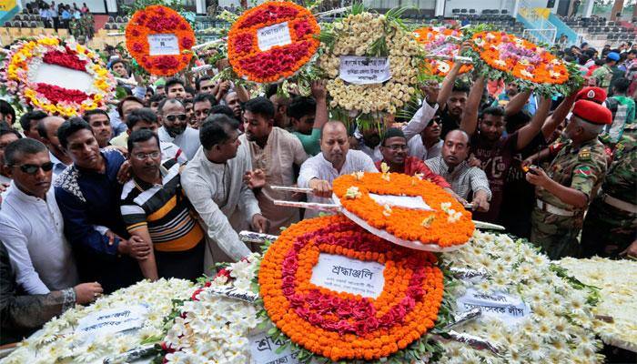 As Bangladesh hunts for clues, thousands bid emotional farewell to Dhaka cafe attack victims