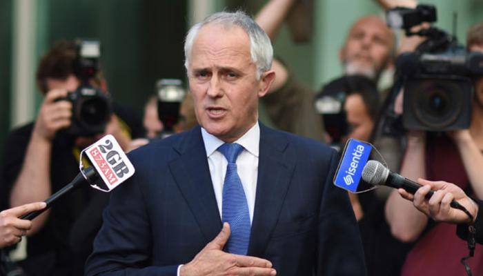 Australian PM Turnbull defies critics, cliffhanger vote count resumes