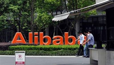 China's Alibaba puts internet in cars, plans to take drivers out