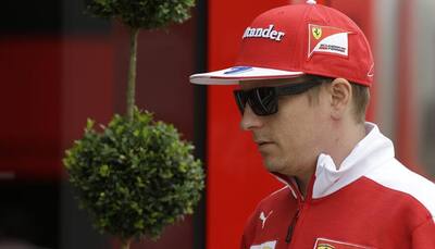 Formula One: Finnish driver Kimi Raikkonen to stay with Ferrari next year