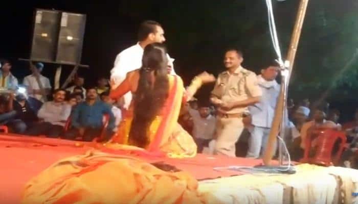 SHOCKING video! UP cop seen dancing, showering money on girl dancer on stage – Must watch