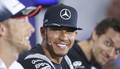 British Grand Prix: Lewis Hamilton fastest as Nico Rosberg hits trouble on Friday sessions