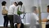Japan's ruling bloc wins landslide in upper house election: Exit polls