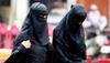 Indonesian child killer escapes jail in a Muslim veil