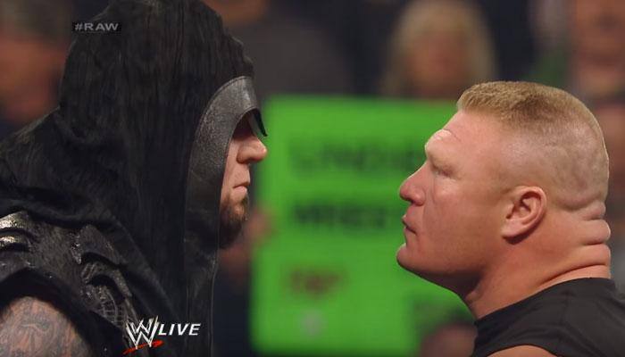 WATCH: SURREAL! The Undertaker chokeslams Brock Lesnar through table on surprise return