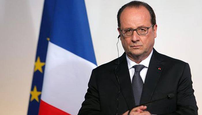 Sombre Hollande denounces third `terrorist` act in 18 months