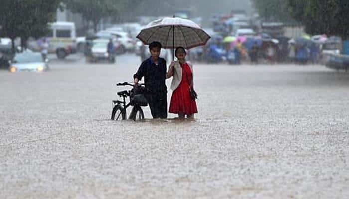 Beijing issues blue alert for rainstorms as winds, hailstorms hit southern China