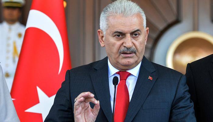 Turkey PM warns against `feeling of revenge` after coup