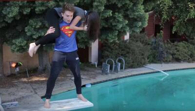 WATCH: CRAZY! Boyfriend recreates WWE finishing moves with girlfriend in the most epic way