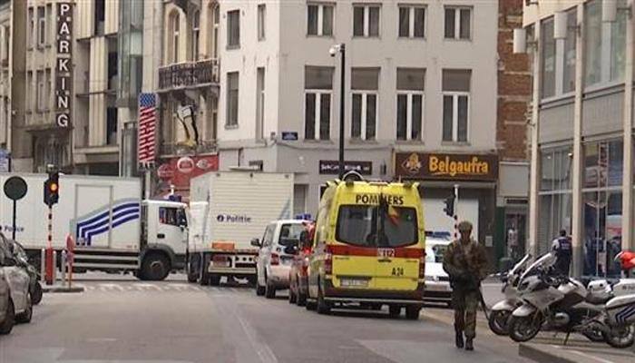 Brussels police surround bomb suspect, cordon off city centre