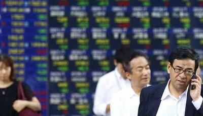 Asian shares at 9-month highs on inflow bets; dollar strong