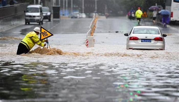 Heavy rain in China kills at least 87, millions evacuated