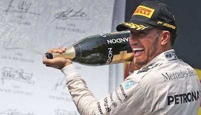 Hungarian Grand Prix: Record fifth win sends Lewis Hamilton top