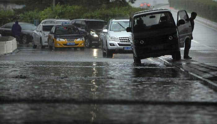 At least 271 killed or missing in China rains, 59,000 troops deployed