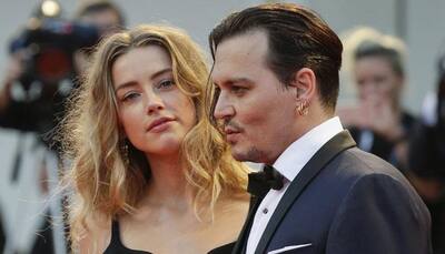 Amber Heard accuses Johnny Depp of stalling divorce