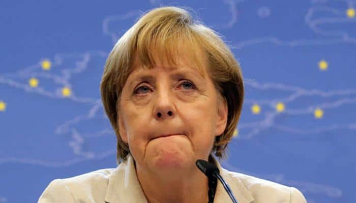 Merkel &#039;firmly&#039; rejects reversing refugee policy after attacks