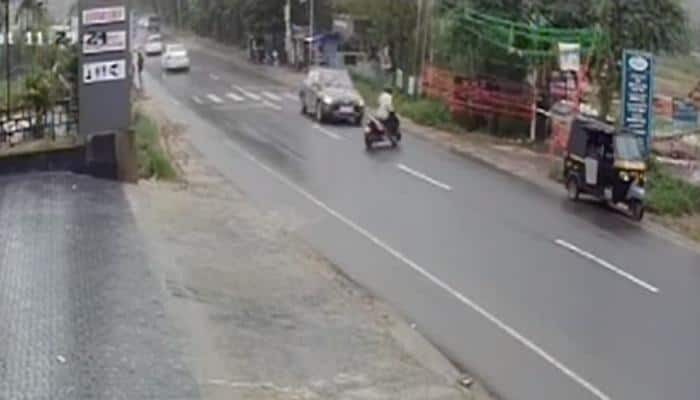 VIRAL VIDEO HORRIFIC accident! Speeding car hits scooter, man flung 20 metres in air