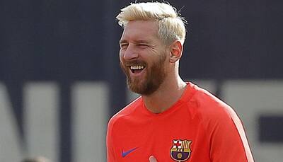 WHAT ON EARTH: Lionel Messi goes blond and Twitter explodes