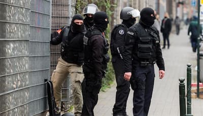 Belgian police officers hurt by machete-wielding assailant shouting 'Allahu akbar'