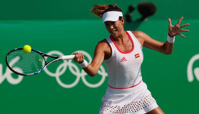 Garbine Muguruza crashes as Andy Murray, Rafael Nadal breeze in Rio