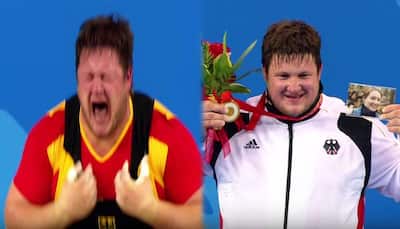 EMOTIONAL VIDEO: Weightlifter loses wife ahead of Beijing Olympics...WATCH what he did next!