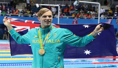 Aussie dad sees footy future for gold medal swimmer 