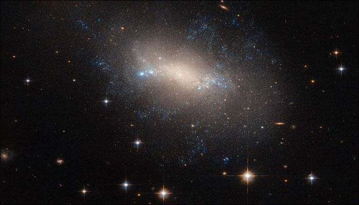 A galaxy askew: NASA's Hubble delivers a queer image – a lopsided lynx! (See pic)