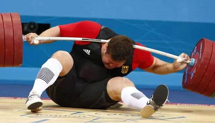 WATCH: OUCH! Beijing Olympics gold medalist drops 196 kgs on neck at London 2012!
