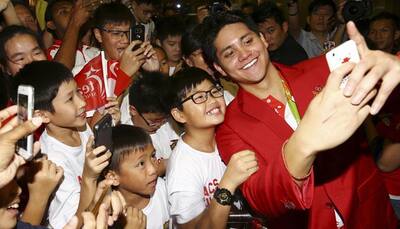 Rio Olympics: After stunning Michael Phelps, Joseph Schooling gets hero's welcome in Singapore