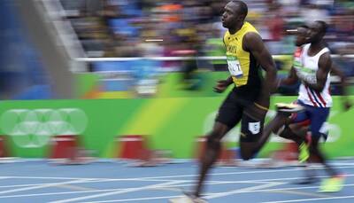 Usain Bolt safely through 200m heats at Rio Olympics 2016