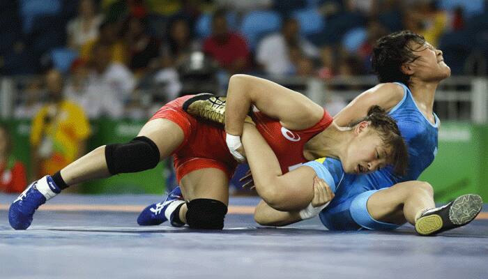 TRUE GOLD! Japan's Eri Tosaka celebrates in epic style after becoming 48 kg wrestling champion - PIC INSIDE