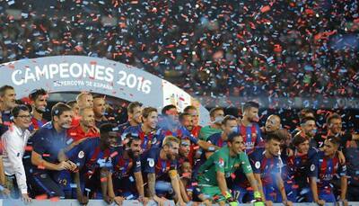 Lionel Messi, Arda Turan lead Barcelona to a romping 3-0 win over Sevilla in Super Cup second leg 