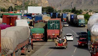 Pakistan shuts border after Afghans burn its national flag during protests
