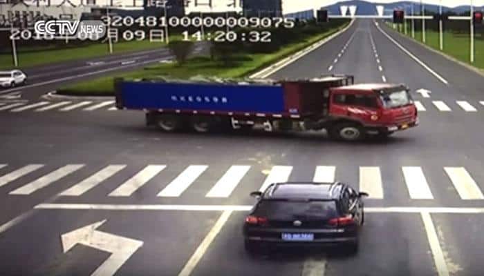 It's going Viral! High speed car jumps red light, rams into truck in China – Watch