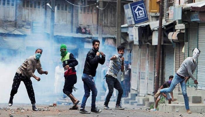 One killed in clash between mob and forces in Srinagar, toll rises to 65