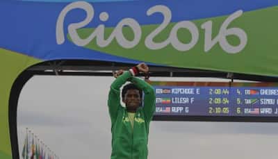 Rio Olympics 2016: Ethiopian runner Feyisa Lilesa in `death` protest