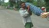 Denied help by hospital authorities, Odisha man walks 10-km carrying wife's dead body; WATCH