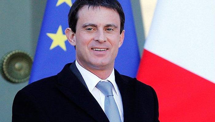 French PM Manuel Valls praises economy, says growth target in reach